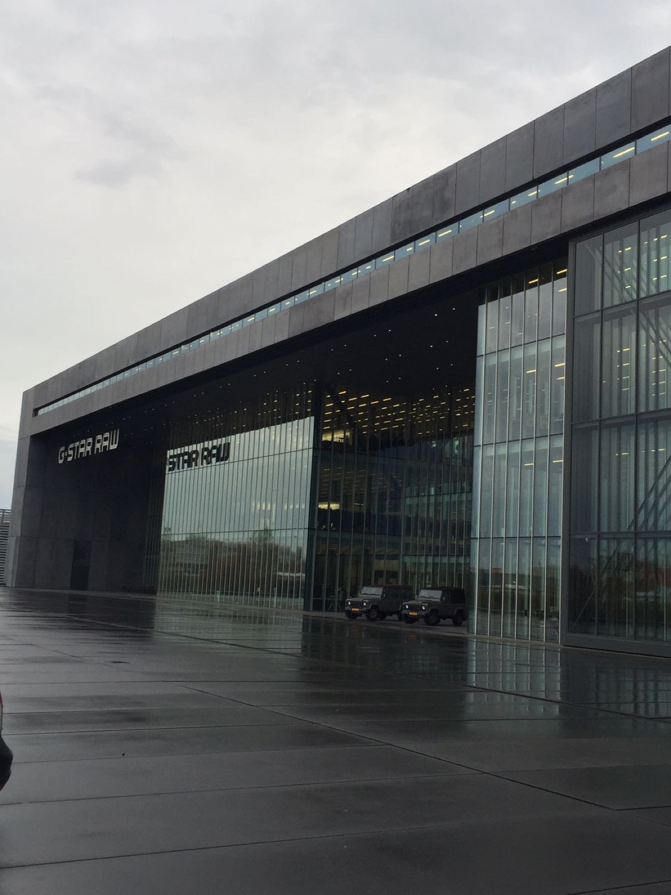 G-Star RAW headquarters in Amsterdam, a long dark concrete and glass building