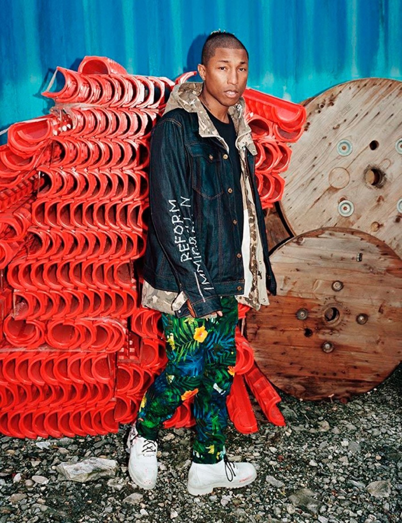 Pharrell Williams in a G-Star denim jacket and tropical-print trousers